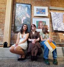 GHS artists Katie Palau, Veronica Donohue, and Kaitlyn Baumgardt (not pictured: Matt Schroeter).