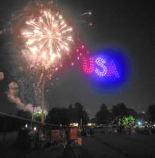 Fireworks burst as drones spell out U.S.A.