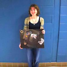 Ava Carroll with her Gold Award winning painting “Stressing.”