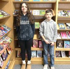 Eighth grader Cora Massaro and seventh grader Luke Hand.