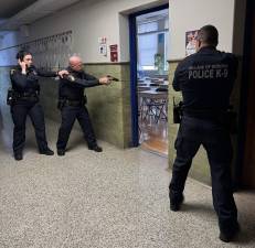 The Goshen Village Police participate in an active shooter training at Goshen High School on Feb. 17.