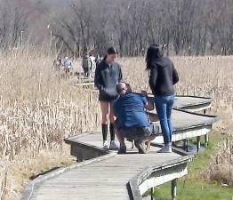 Folks get out and enjoy pre-spring weather at the boardwalk section of the Appalachian Trail on Route 517. As one hiker put it, might as well walk, there's no place else to go.