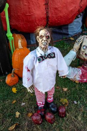 <b>Small but scary, this little zombie is one of many creepy creatures filling the yard on Gariss St. (Photo by Aja Brandt)</b>