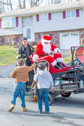 Santa Claus was driving through town