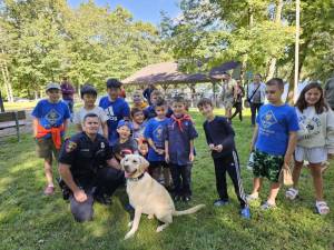 On September 8, Goshen Village Police Officer Jeremy Harter and K-9 Walker, conducted a K-9 demonstration for Boy Scout Pack 44.