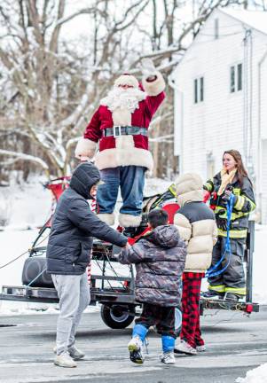 The Chester Fire Department brings Santa to June Road in Chester on December 21.