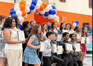 Students are all smiles after receiving their awards.