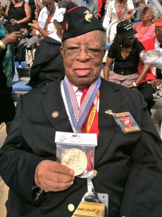 Ernest Smith at last year with his Congressional Gold Medal at the awards ceremony. (Photo courtesy of the Smith family)