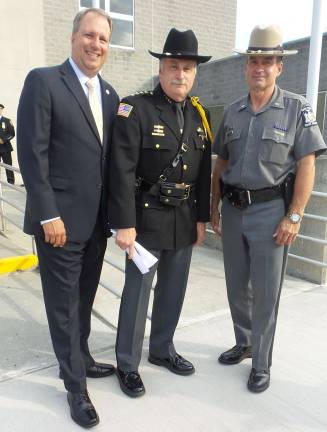 From left: Orange County District Attorney David Hoover, county Sheriff Carl DuBois, and Lt. Hector Hernandez, New York State Trooper, at a peace vigil honoring fallen Dallas, Texas, officers last July (Photo by Frances Ruth Harris)