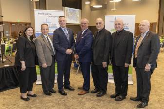 Catholic Charities of Orange, Sullivan &amp; Ulster CEO Shannon Kelly, Vice President of Operations for ShopRite Supermarkets Michael Schoendorf, Port Jervis Police Chief William Worden, Ulster Savings Bank CEO William Calderara, Fr. Bob Porpora of St. Peter’s in Monticello, Fr. Joseph Tokarcyzk of Sacred Heart in Highland Falls, and Catholic Charities Board Chair Thomas Strahle.