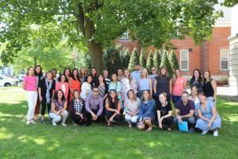 New faculty members with their mentors at the new staff orientation ahead of the start of the school year.