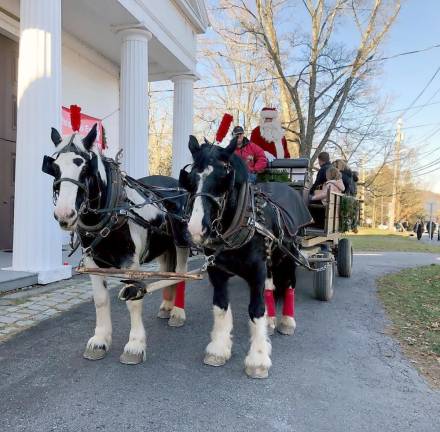 Sugar Loaf holiday fest brings carolers, Santas, horses and shoppers