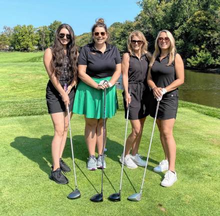 The winning women’s foursome at Catholic Charities 18th annual Golf for Charity Outing: Irina Negru, Brittany Johnson, Kathy Cole, and Taylor Craig.