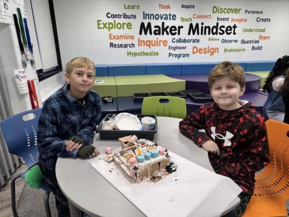 Chester fifth graders build gingerbread houses on a budget