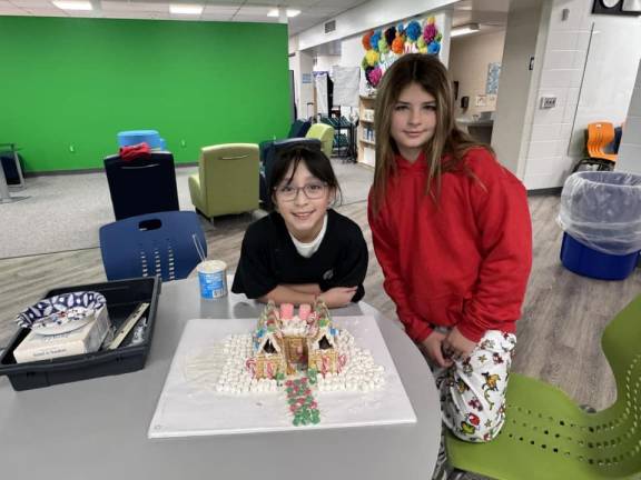 Chester fifth graders build gingerbread houses on a budget