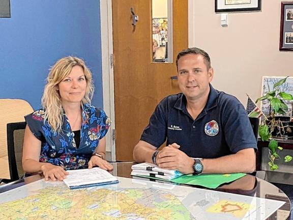 Rebecca Sheehan with County Executive Steve Neuhaus.