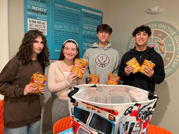 Fianna Goldenberg of Warwick, and Ruby Eberly, Jamie Reich and Eitan Einav of Monroe collect essential items at CTeen of Orange County for the Jennings Creek Wildfire first responders.