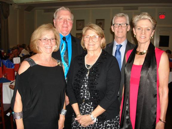 Organizers of the Goshen Central High School Class of 1966 50 Reunion take a few minutes to pose for a group photo. Front (from left): Sue Ellen (Crist) Samuelson, Jeanne Pahucki, and Gail (Van Cura) Van Tassel. Rear: Malcolm Stewart and Bill Standish (Photo by Geri Corey)