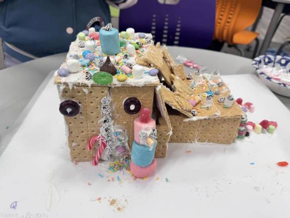 Chester fifth graders build gingerbread houses on a budget