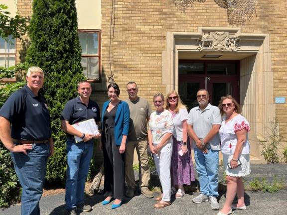 L-R: Orange County Legislator Glenn Ehlers, County Executive Steve Neuhaus, Superintendent of Chester United Free School District Catherine O’Hara, along with other school members, Village of Chester Mayor Christopher Battiato, Deputy Mayor Elizabeth Reilly and Trustee Anthony LaSpina.