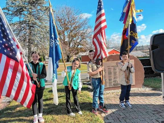 The Girl Scouts joined the Boy Scouts to honor local veterans on Monday, Nov. 11.