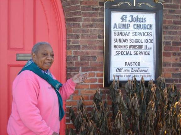 Mary Sumter welcomes one and all to services and fellowship at St. John&#x2019;s African Union Methodist Protestant Church (Photo by Geri Corey)