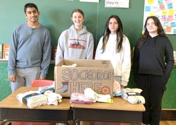 L-R: Thehan Lekamalage, Julianna Loftus, Lucy Davila, and Anna Shapiro.