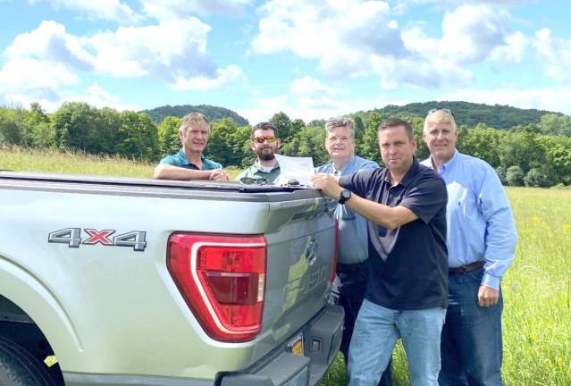 County Executive Steve Neuhaus, along with Chris Palmer, Jeremy Schneider, Jim Delaune, and Glenn Ehlers.