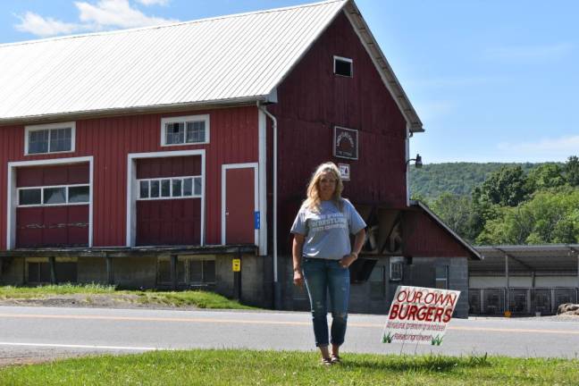 Holly Sytsema, at her farm in Wantage, is consulting with state lawmakers as they hammer out new state heat regulations.