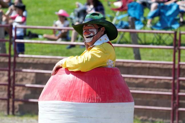 Rusty The Clown entertains the spectators between each bull riding set.