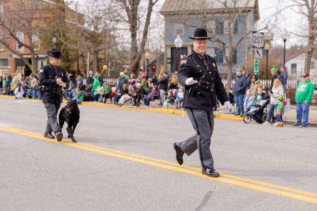 Newly elected Orange County Sheriff Paul Areta waving at the Mid-Hudson St. Patrick's Day Parade in Goshen, NY on March 12, 2023. Photo by Sammie Finch