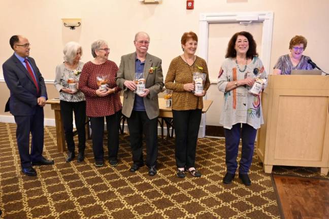 People for People Fund President Nolly Climes; volunteers Carol Fenichel, Marilyn Hoffman, George Cullen, Lee Baranowski and Lynn Skolnick; and People for People Fund Executive Director Marsi Ann Clark.