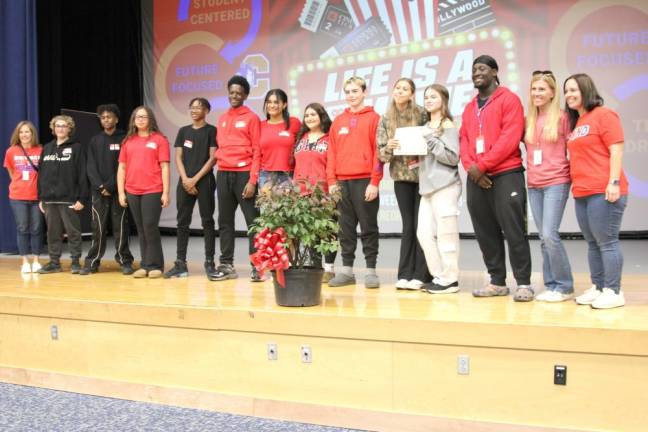 Chester Academy students join Goshen students on stage to present the burning bush.