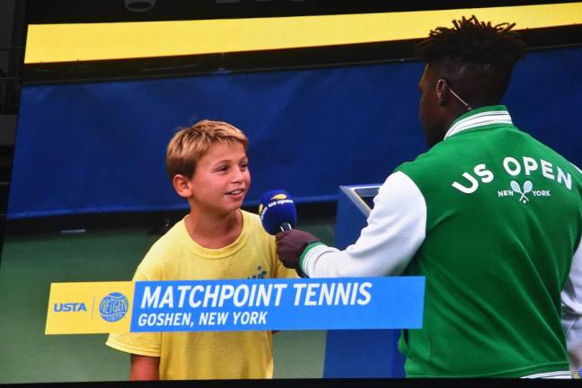 Chase DeSilva, 10, of Campbell Hall, named “Coach Maeve” his favorite tennis player during his interview.