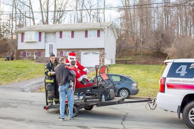 Santa Claus was driving through town