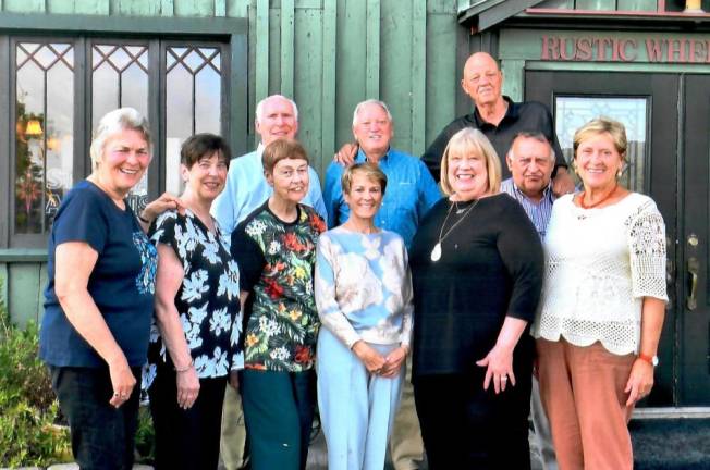 L-R Front: Rita DeVries, JoAnn Lekis, Edith Medley, Donna Nizolek, Barbara Kania, and Marianne Buschmann. L-R Back: E. Peter Kane, John Bell, Richard O’Neill, and Tony Valastro. Not pictured: Angela McDonald, Walt Nizolek, and Robert Wallace.