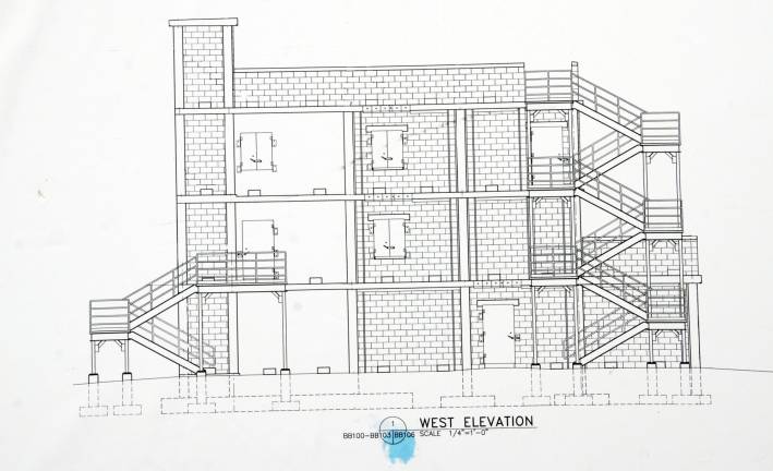 Photos by Ed Bailey The layout and design of the new burn building at the county&#xed;s fire training center in New Hampton will provide firefighters with a greater variety of training experiences than the current building because it will have more rooms and different kinds of roofs.