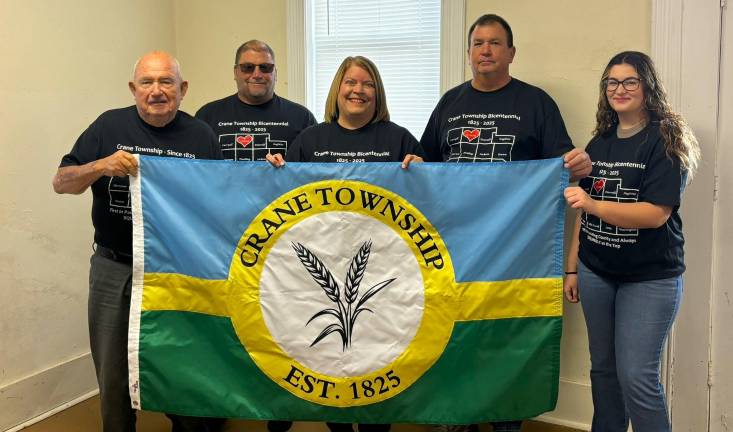 Crane Township Trustee Joe Sukup, Crane Township Trustee Mike Meyer, Crane Township Fiscal Officer Carol Razo, Crane Township Trustee Kevin Stuart and flag designer Anna Wells.