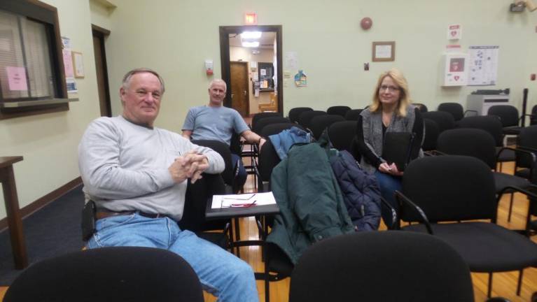 Larry Dysinger, Tom Becker and Tracy Schuh before the Chester Town board meeting began. (