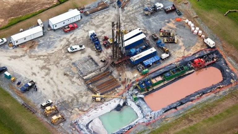 This photo from the Web site of the nonprofit U.S. Water Alliance group shows a hydrofracking station in operation.