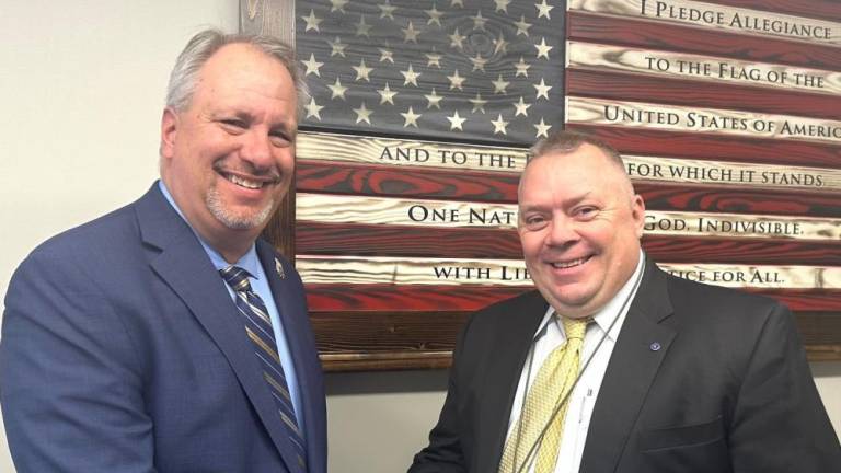 Orange County District Attorney David Hoovler with Andrew Stack.