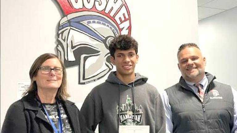 Kiran Foster (center) with his guidance counselor, Laura Dubatowka, and GHS Principal Nick Pantaleone.